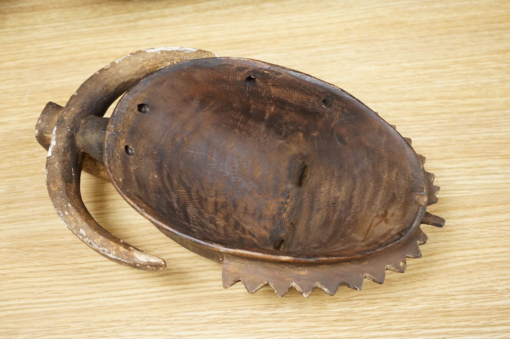 A Yaure carved African mask, from the Ivory Coast, 32cm high